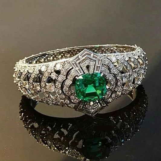 Art-deco smaragdring in wit goud
