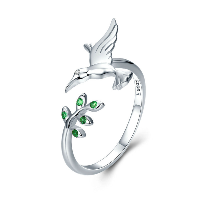 Groene ring Kameleon met steentjes in wit goud