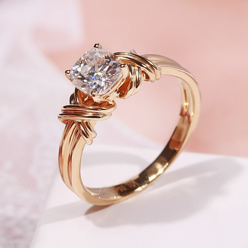 Statement-ring met strik in goud