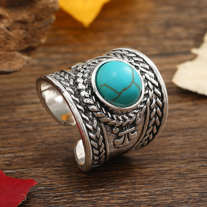 Open ring Ravik met steen in wit goud