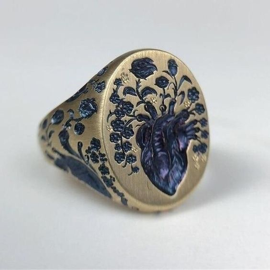 Retro ring met blauwe bloem in goud