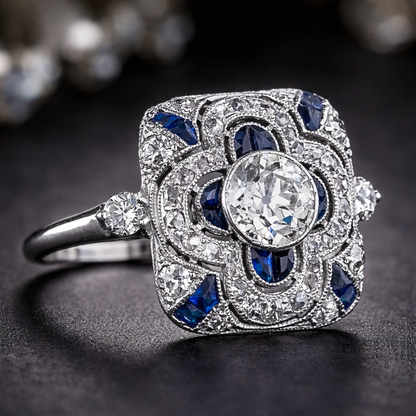 Retro ring met blauwe steentjes in wit goud