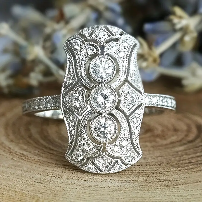 Glinsterende retro ring in wit goud