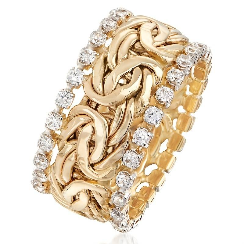Gevlochten retro ring met steentjes in goud