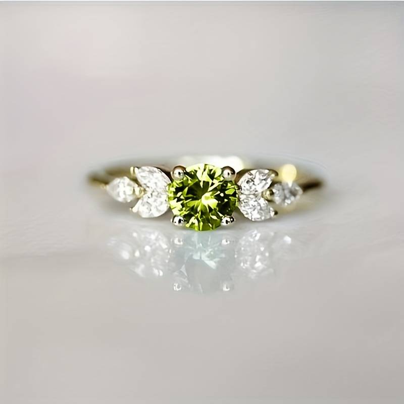Groene vintage ring met steentjes in goud