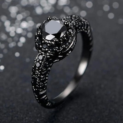 Vintage koperen ring met zwarte steen in goud