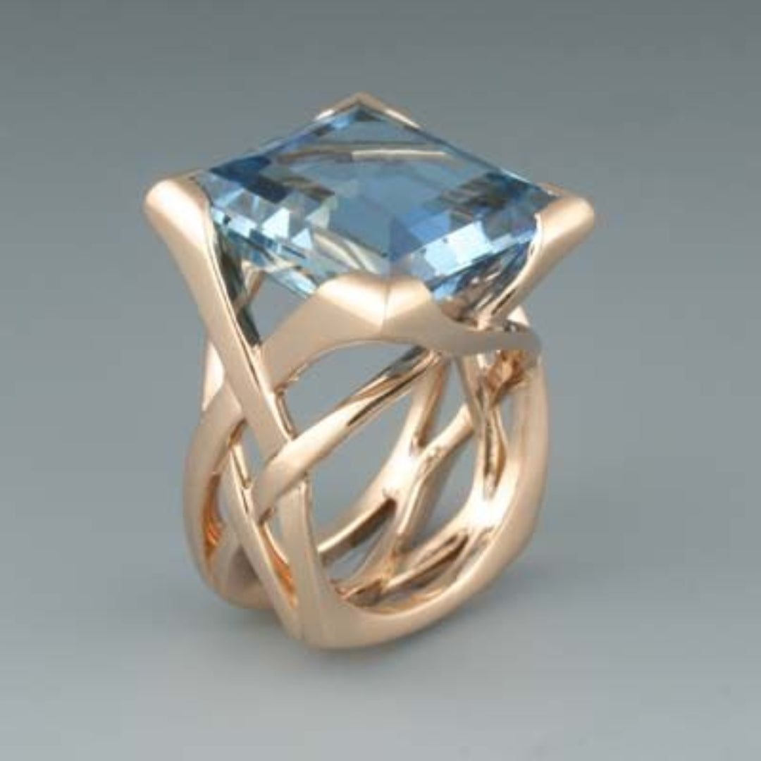 Vintage ring met blauwe steentjes in roségoud