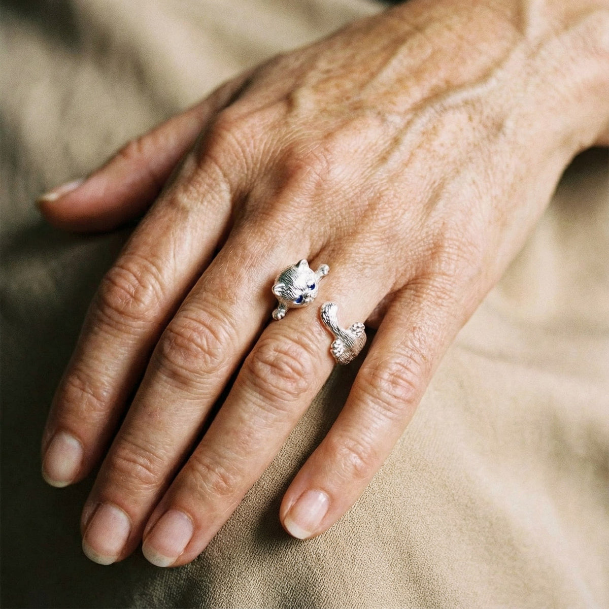 Verstelbare 925-ring met katjes in wit goud
