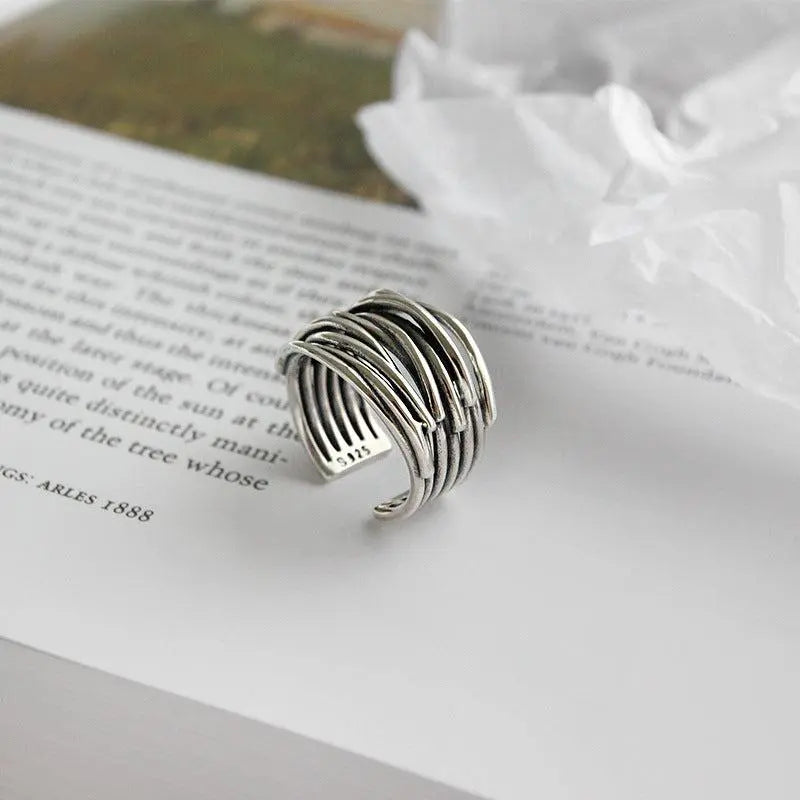 Verstelbare gelaagde ring | Witgoud