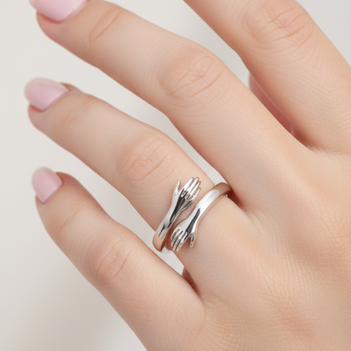 Verstelbare ring in omhelzingsstijl in wit goud