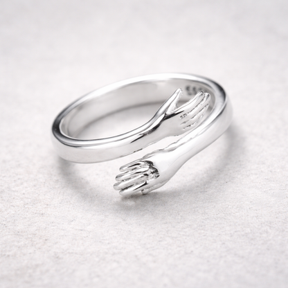 Verstelbare ring in omhelzingsstijl in wit goud
