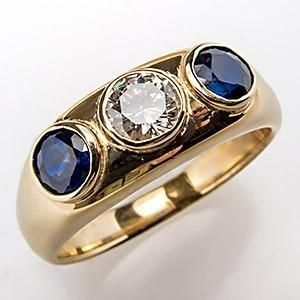 Ring met steentjes en blauw kristal in goud