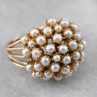 Ring met parelornamenten in goud