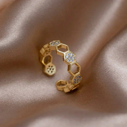 Kristallen honingraatring in goud