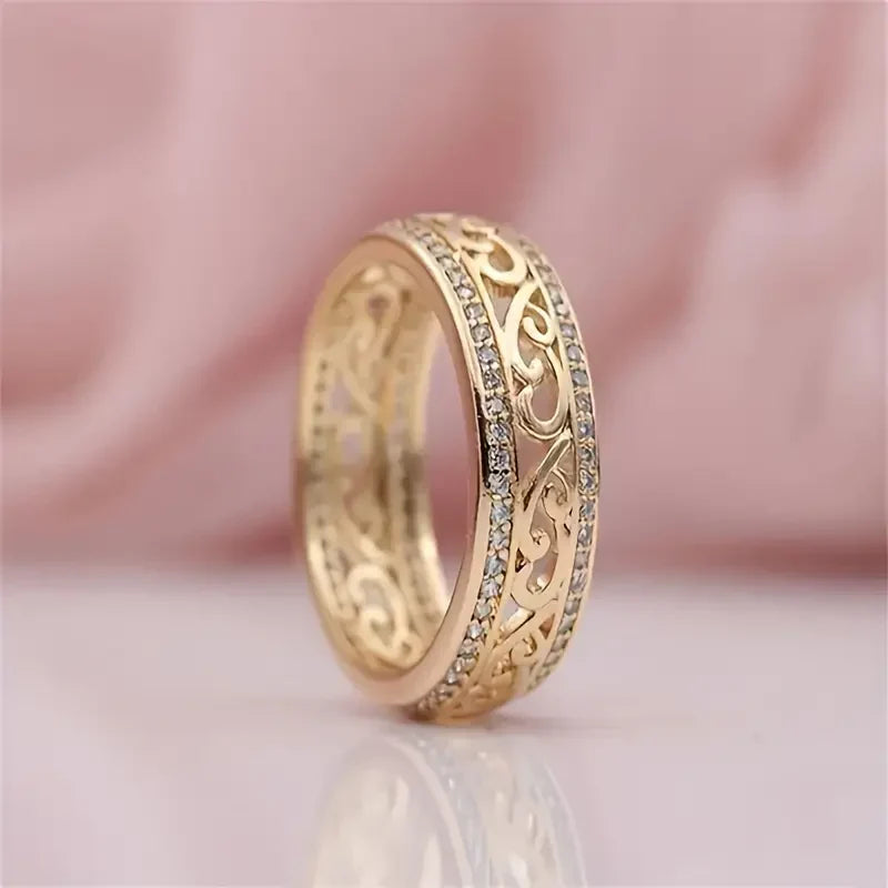 Glinsterende holle ring in goud