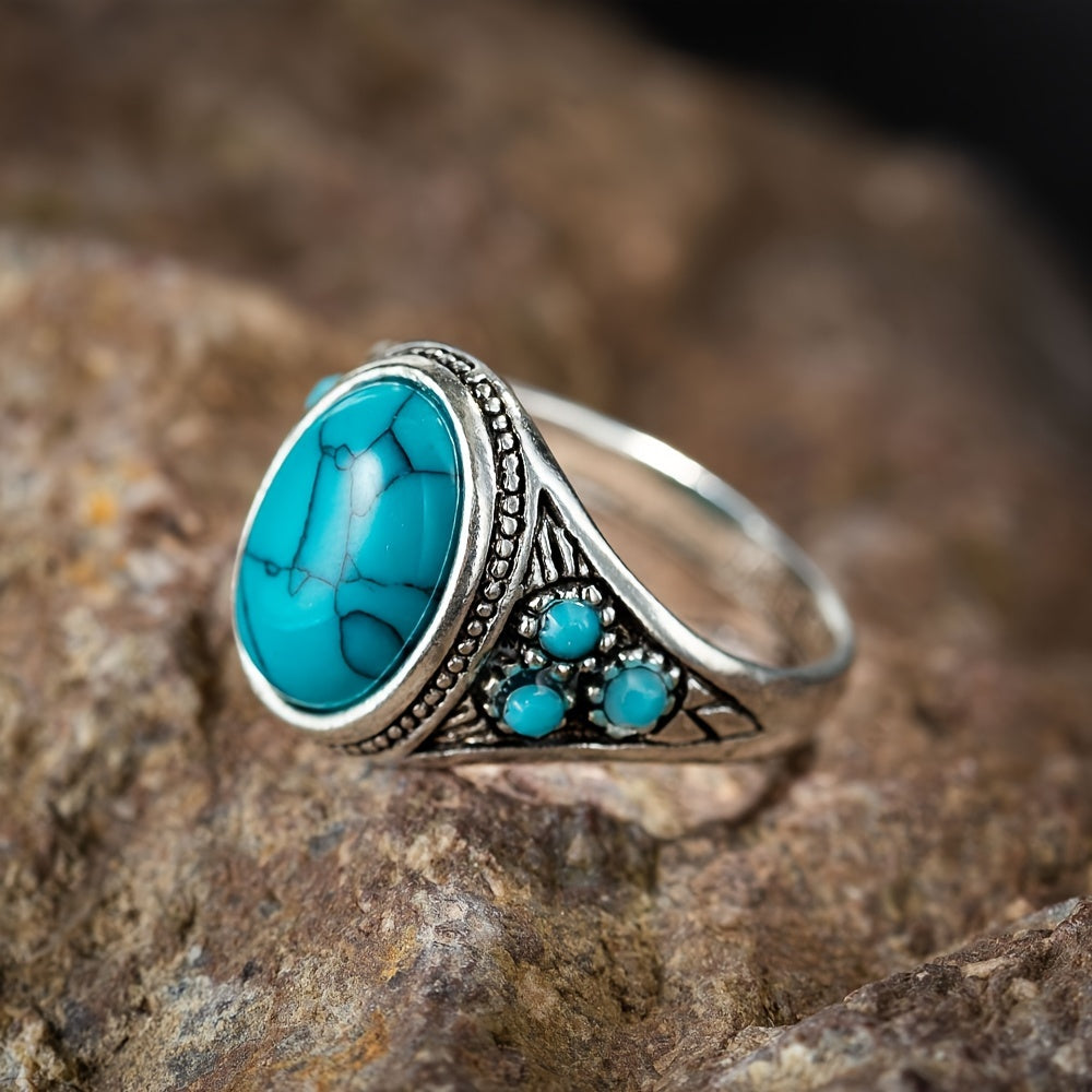 Ring Nomade met blauwe steen in wit goud