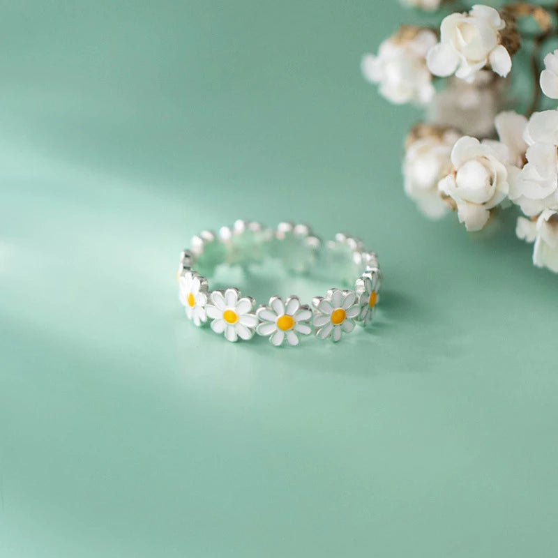 Madeliefjesring in wit goud