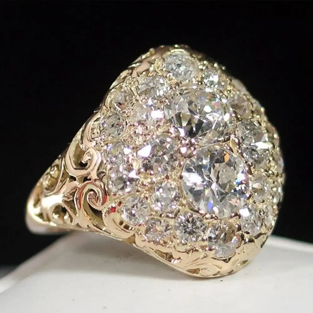 Retro ring met rode steen en diamant in wit goud