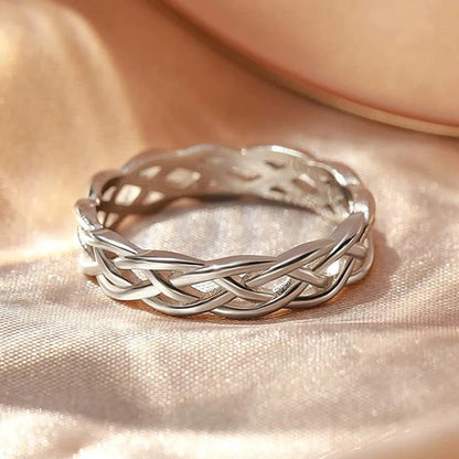 Gevlochten messing ring met stempel in wit goud