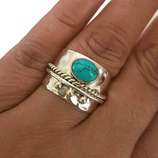 Brede ring met turquoise in goud