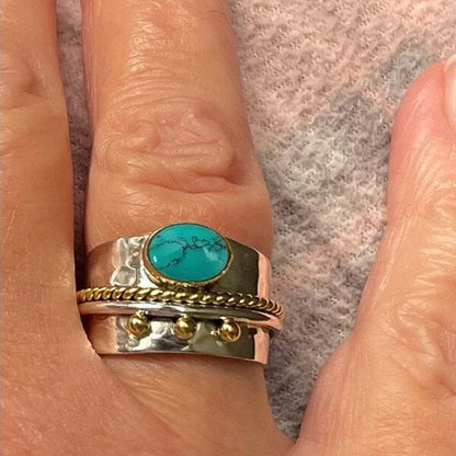 Brede ring met turquoise in goud