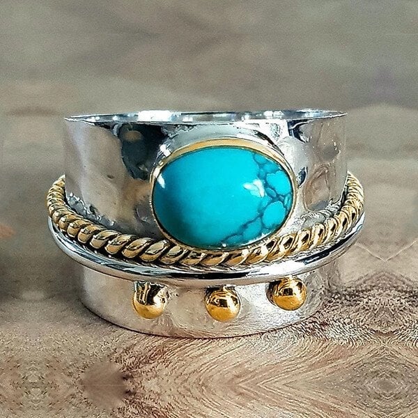 Brede ring met turquoise in goud