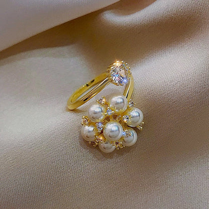 Verstelbare ring met schattige parels in goud