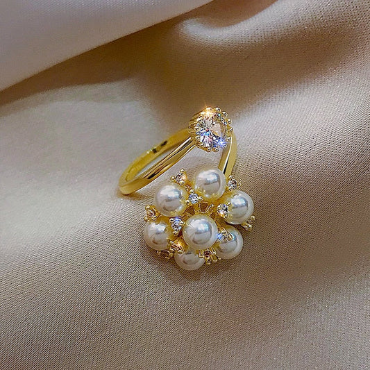 Verstelbare ring met schattige parels in goud