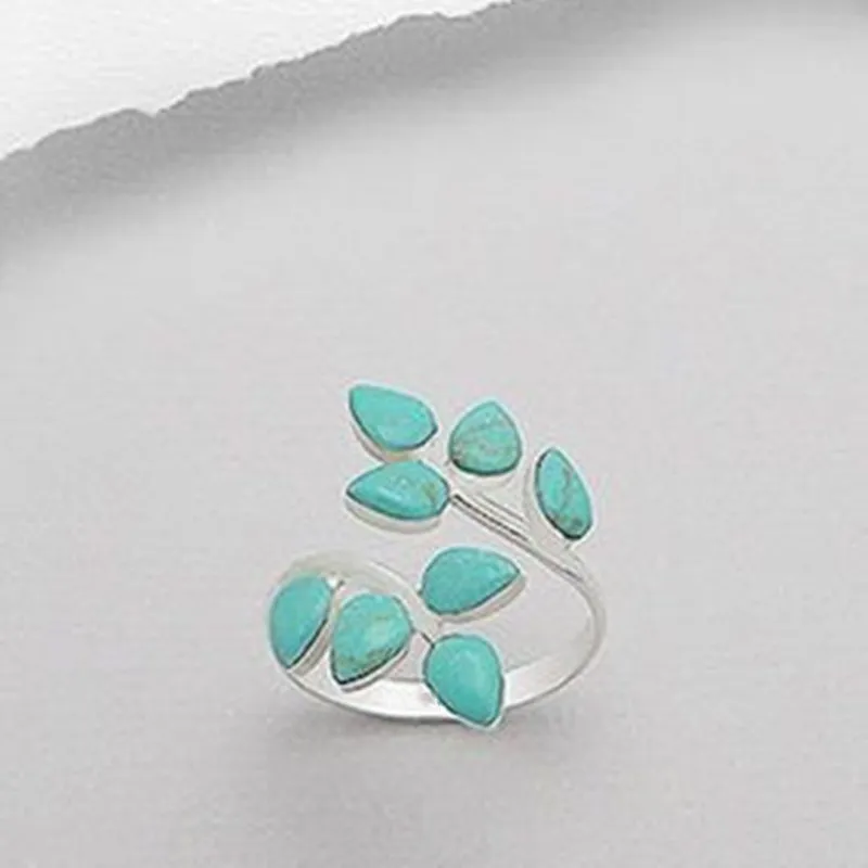 Retro ring met turquoise blad in goud