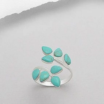 Retro ring met turquoise blad in goud