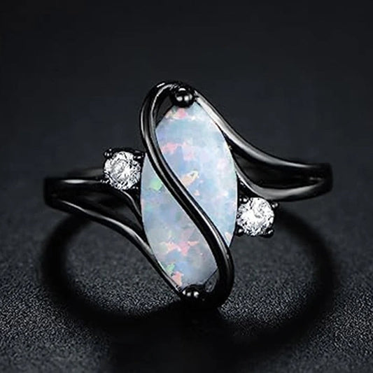 Retro ring met gedraaid zwart opaal in goud