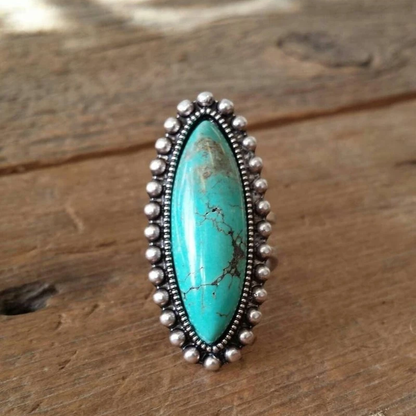 Retro ring met turquoise steen in goud