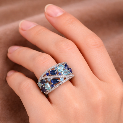 Retro ring met blauwe steentjes in goud