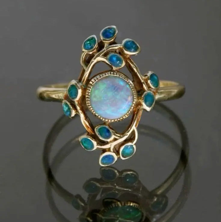 Blauwe retro ring met kristallen en opaal | Goud