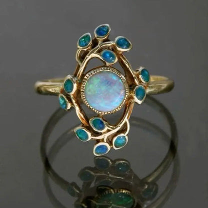 Blauwe retro ring met kristallen en opaal | Goud