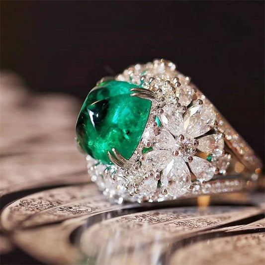 Retro bloemring met groene steen en diamanten | Goud