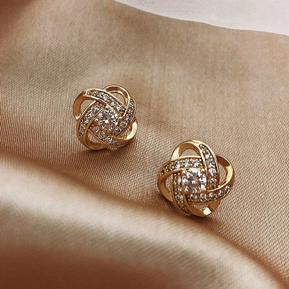 Oorbellen met glinsterende bolletjes in goud