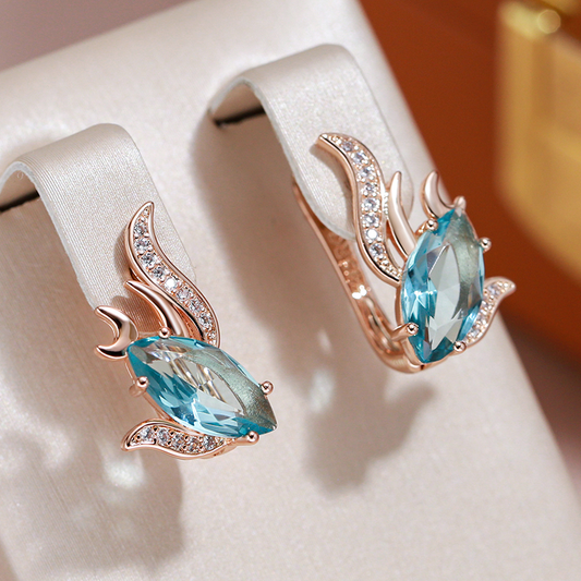 Oorbellen met turquoise kristallen | Goud