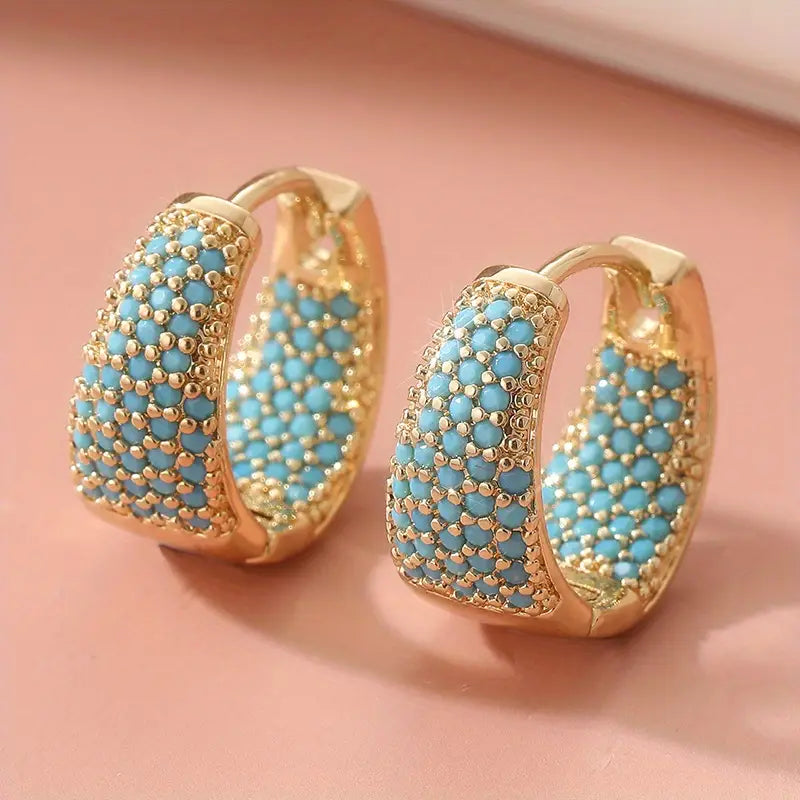 Creolen met turquoise parels in goud