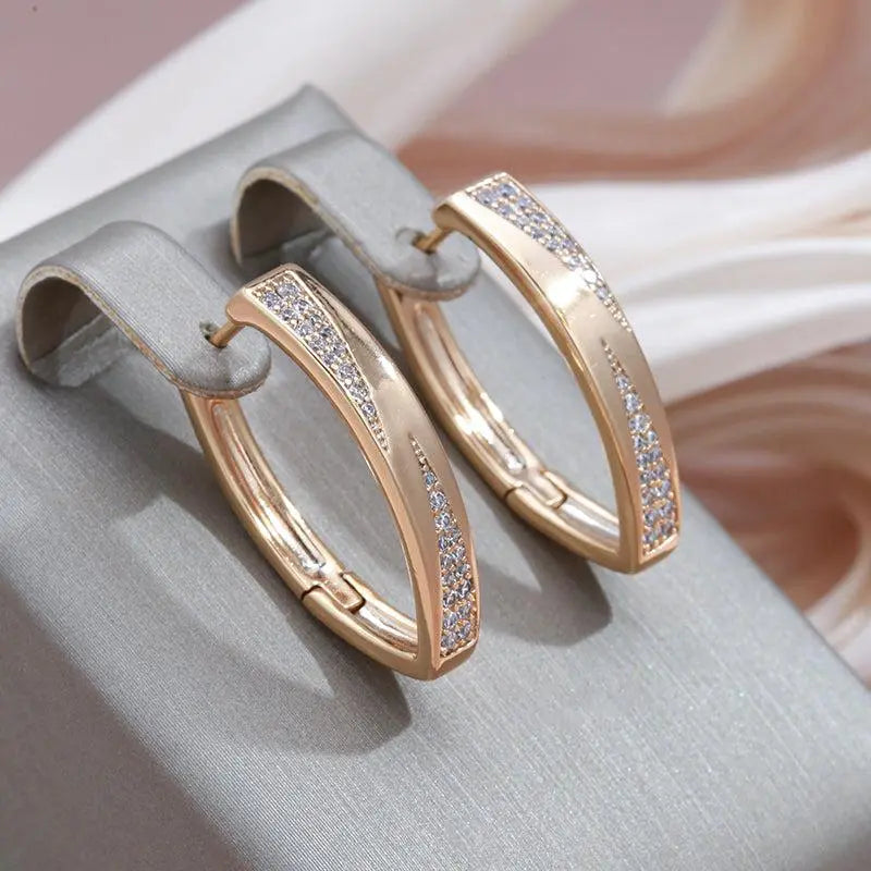 Stralende diamantoorbellen in goud