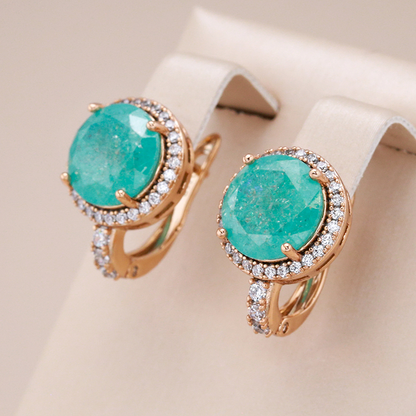 Elegante oorbellen met turquoise en opaal in goud