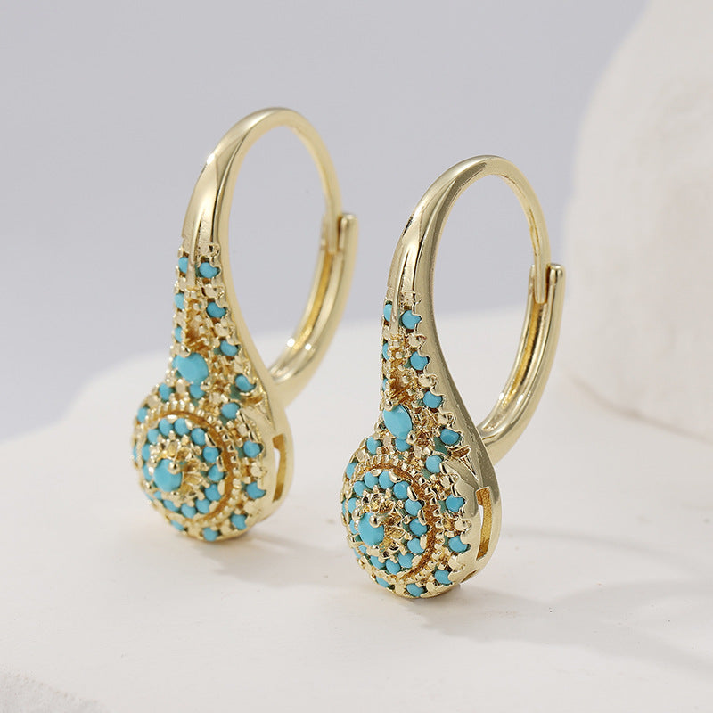 Turquoise tros-oorbellen Valenne in goud