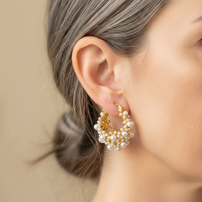 Oorbellen met vintage design en parels in goud