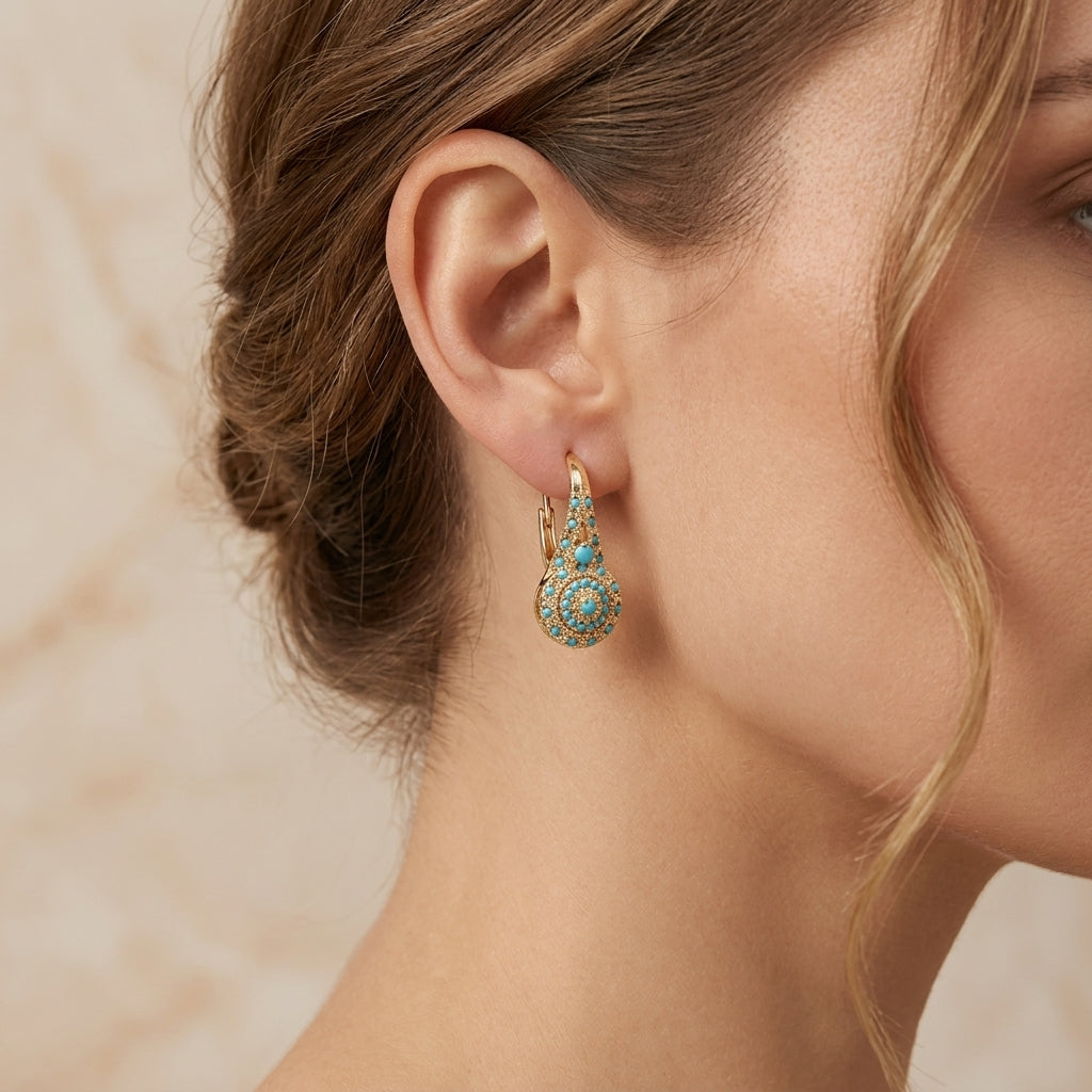 Oorbellen met turquoise | Goud