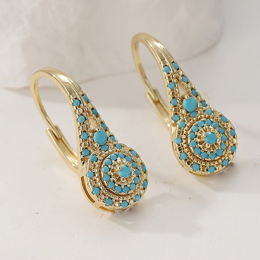 Oorbellen met turquoise | Goud