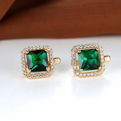 Oorbellen met vierkante groene steen in goud