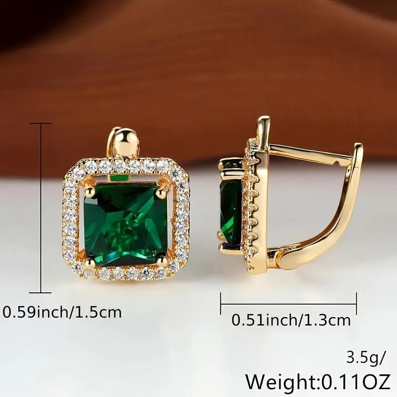 Oorbellen met vierkante groene steen in goud