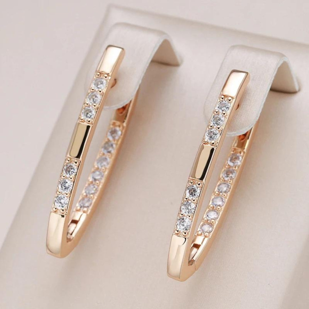 Elegante oorbellen met steentjes in goud