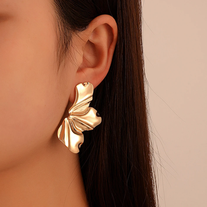 Exotische oorbellen in goud