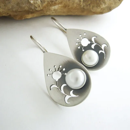Retro oorbellen met bloem en madelief in goud